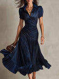 Adriana | Vestido midi satinado de rayas
